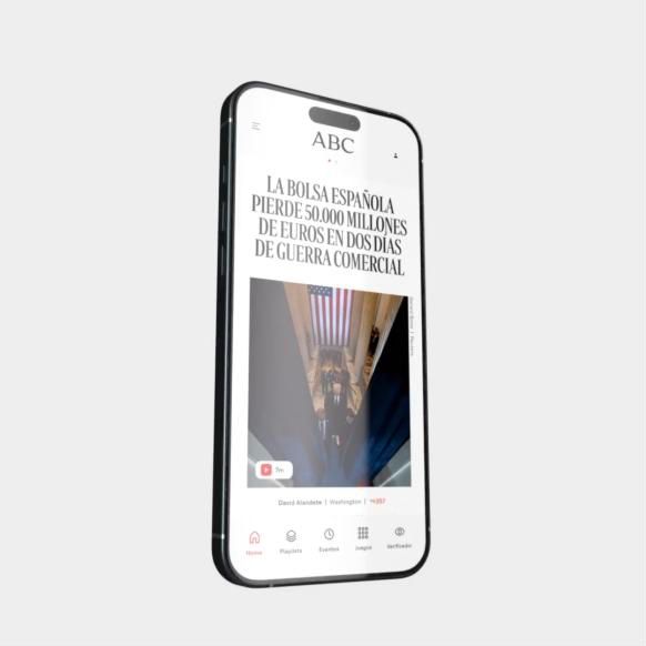 A phone showing the redesigned ABC news app